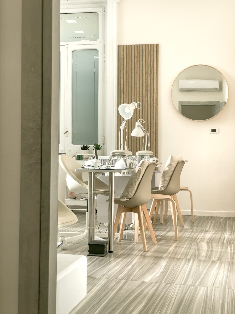 a dining room with a table and chairs